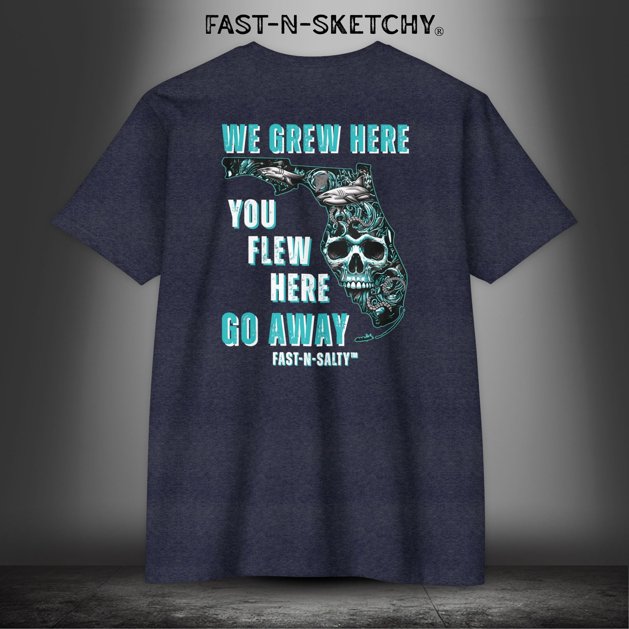 WE GREW HERE, YOU FLEW HERE, GO AWAY: Teal on Black T-Shirt Next Level 6210