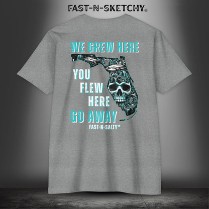 WE GREW HERE, YOU FLEW HERE, GO AWAY: Teal on Black T-Shirt Next Level 6210