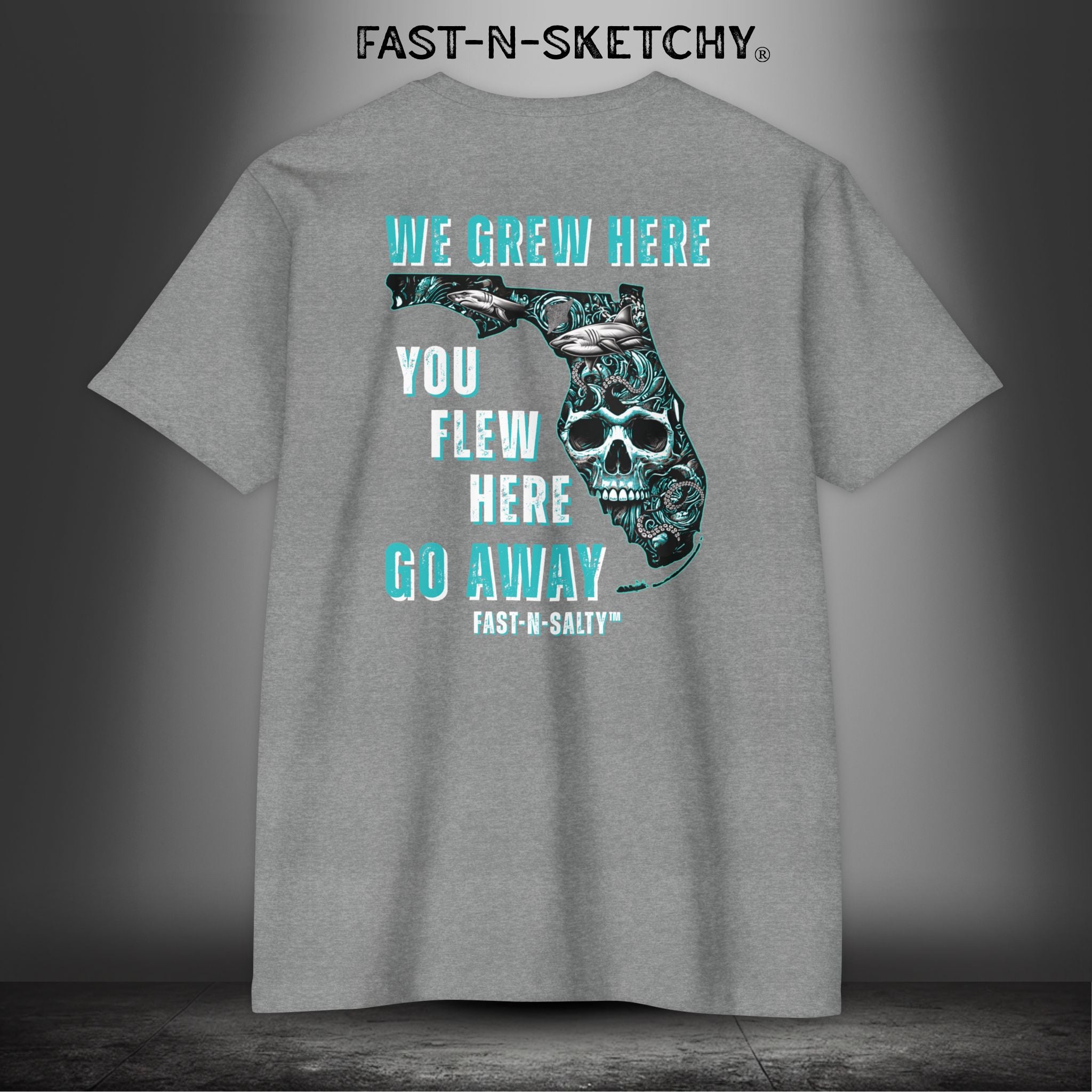 WE GREW HERE, YOU FLEW HERE, GO AWAY: Teal on Black T-Shirt Next Level 6210