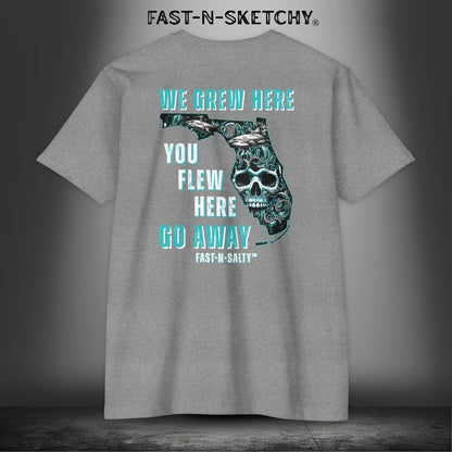 WE GREW HERE, YOU FLEW HERE, GO AWAY: Teal on Black T-Shirt Next Level 6210